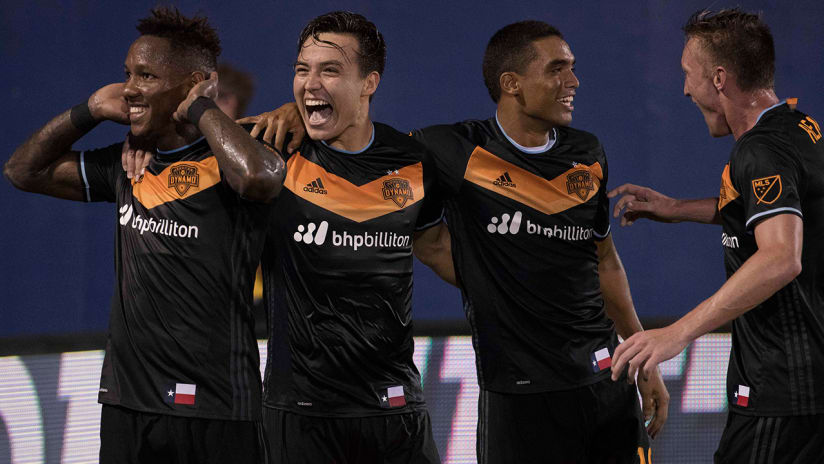 Erick Torres - Houston Dynamo - celebrates a goal with teammates