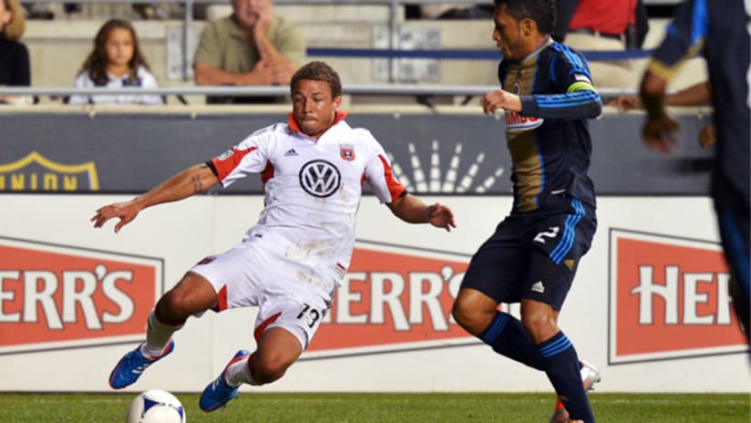 D.C. United's Nick DeLeon gets to the ball just ahead of Philadelphia's Carlos Valdes