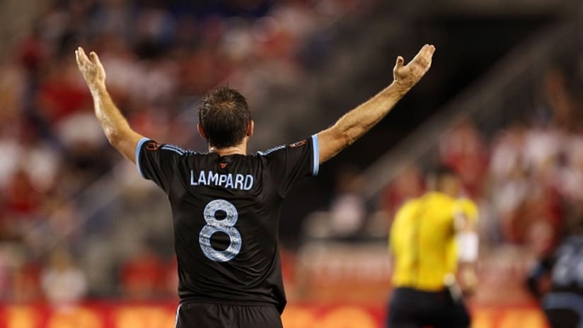 Frank Lampard raises him arms at Red Bull Arena