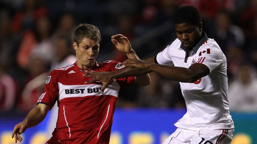 Chicago's Logan Pause and Toronto's Joseph Nane battle for the ball on Wednesday night at Toyota Park.