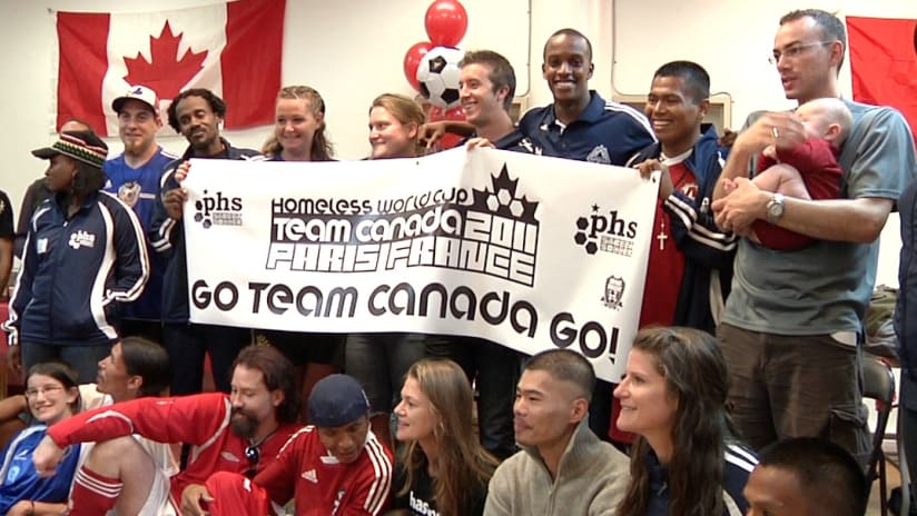 Members of the Vancouver Whitecaps meet the Canadian Homeless soccer team.