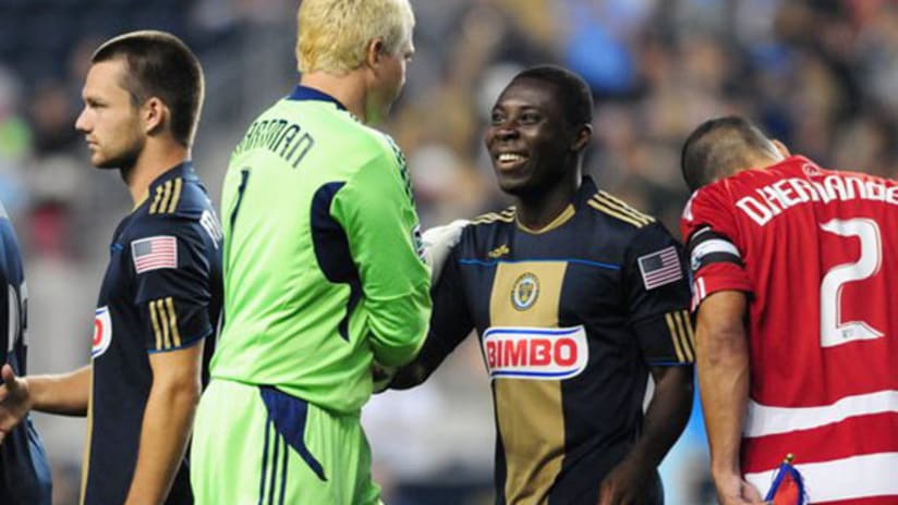 Freddy Adu shares a laugh with Kevin Hartman