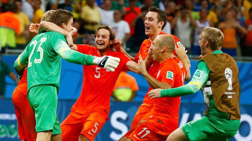Netherlands celebrate goalkeeper Tim Krul