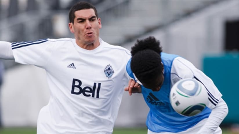 Michael Boxall (left) was one of 25 Whitecaps FC players in action on Tuesday.
