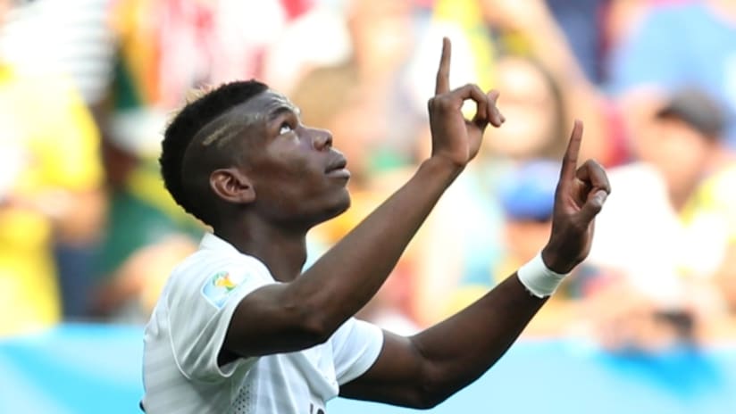 Paul Pogba savors the go-ahead goal against Nigeria