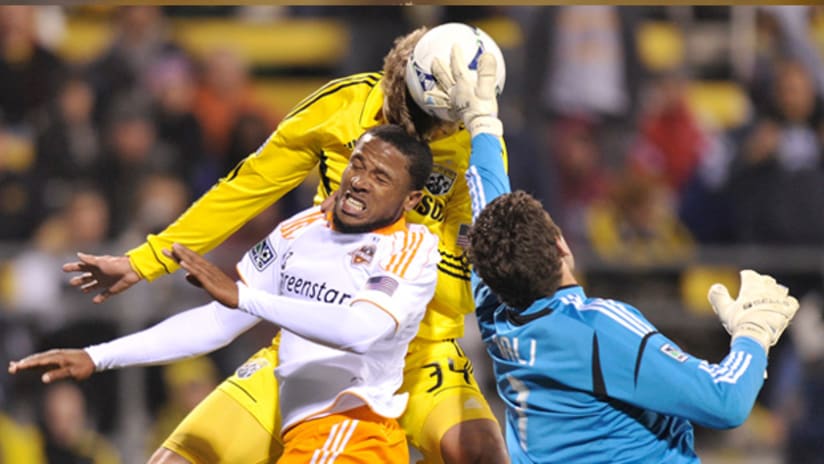 Houston's Tally Hall makes a save against the Columbus Crew