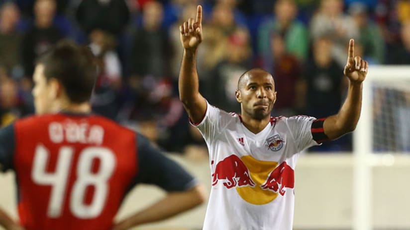 Thierry Henry celebrates after beating Toronto FC