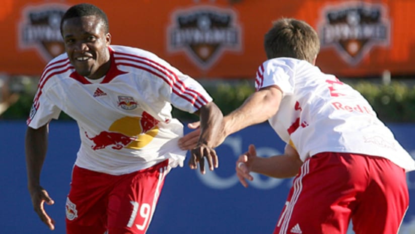 New York's Dane Richards (left) celebrates an assist during the Red Bulls' 3-0 win over the Houston Dynamo during the 2008 Western Conference semifinals.