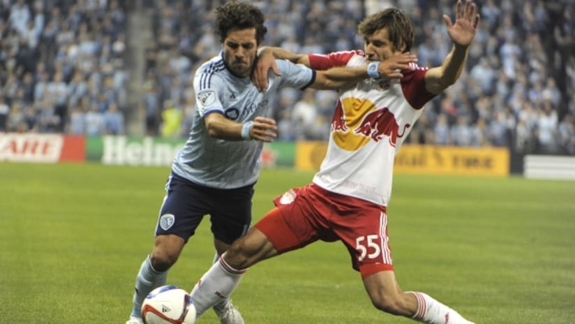 Damien Perrinelle tackles Benny Feilhaber