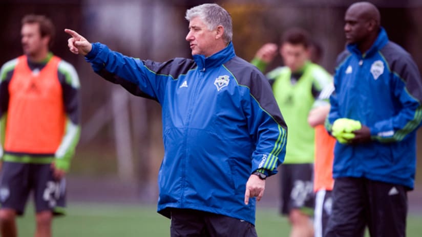 Seattle head coach Sigi Schmid giving out directions during the first day of training.