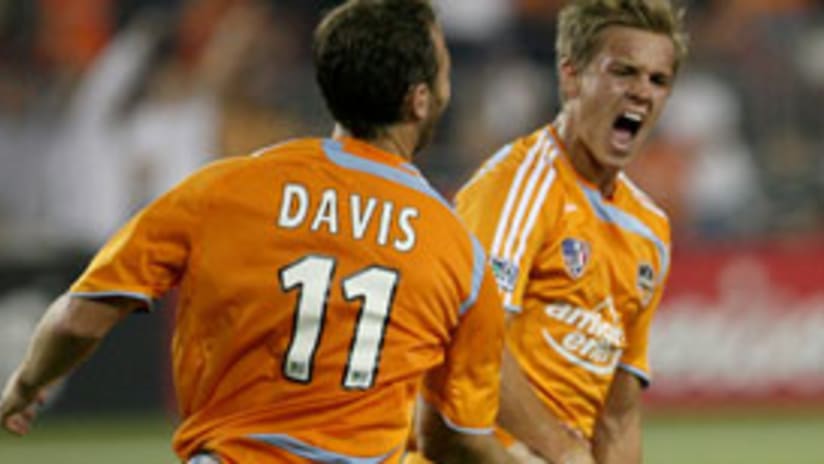 Brad Davis (left) and Houston, along with D.C. United, will enter CONCACAF play in mid-March.