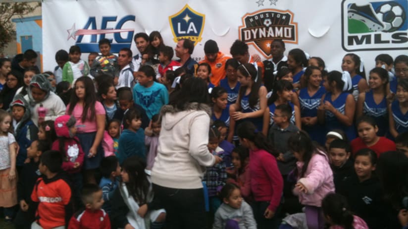 Galaxy and Dynamo players celebrate the dedication of a new field in East LA