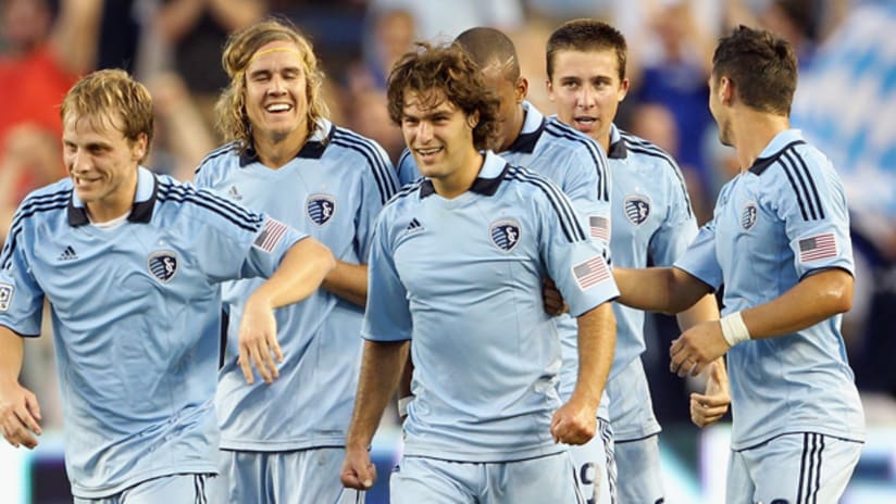 Sporting KC celebrate the second of Graham Zusi's goals against Portland