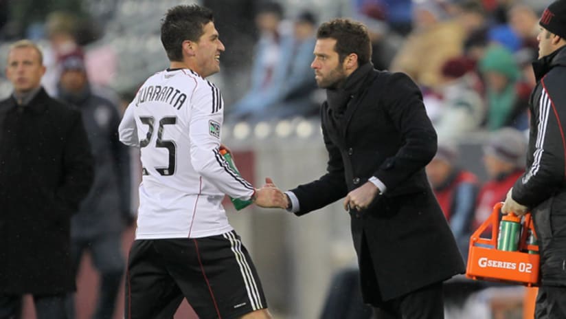 Santino Quaranta is congratulated for his goal by head coach Ben Olsen of D.C. United against the Colorado Rapids on April 3, 2011.