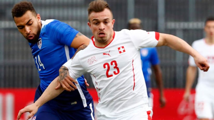 USMNT's Danny Williams battles for position with Switzerland's Xherdan Shaqiri