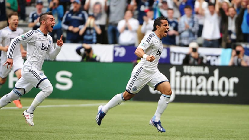 Russell Teibert chases Camilo to celebrates the latter's freekick goal for Vancouver vs. Portland.