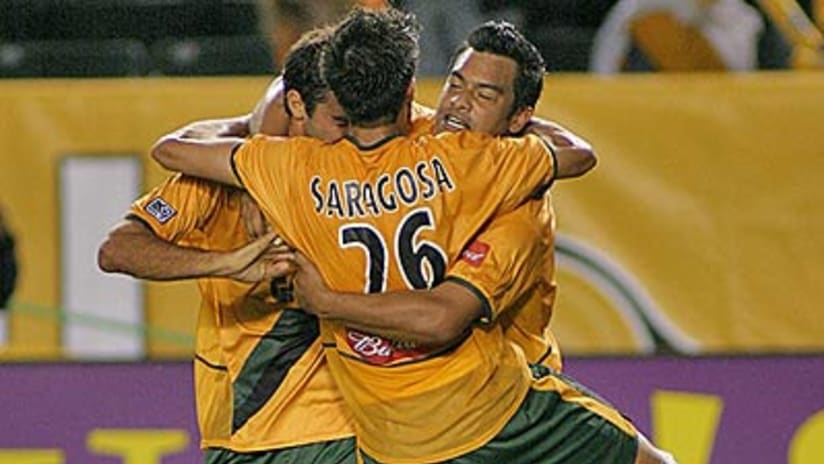 Carlos Ruiz (right) celebrates his goal against Colorado on Saturday.
