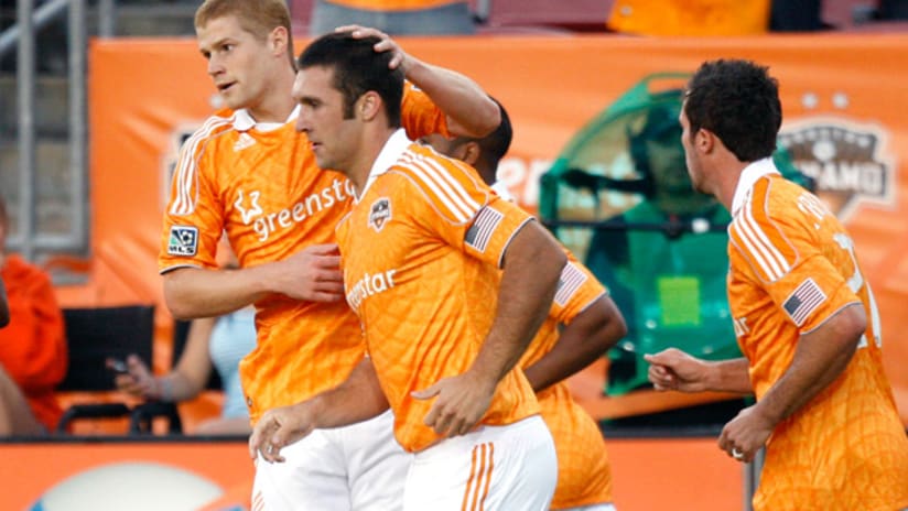 Houston's Will Bruin celebrates after scoring one of his three goals in a 4-1 win over D.C. United.