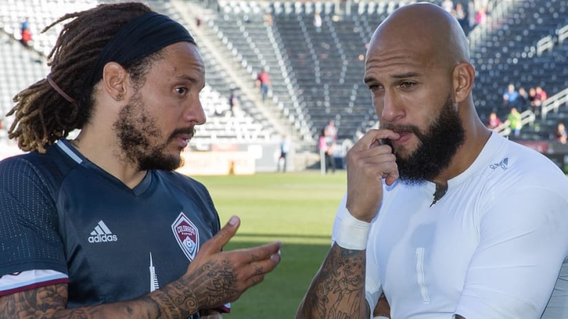 Jermaine Jones and Tim Howard chatting after Rapids game - close-up