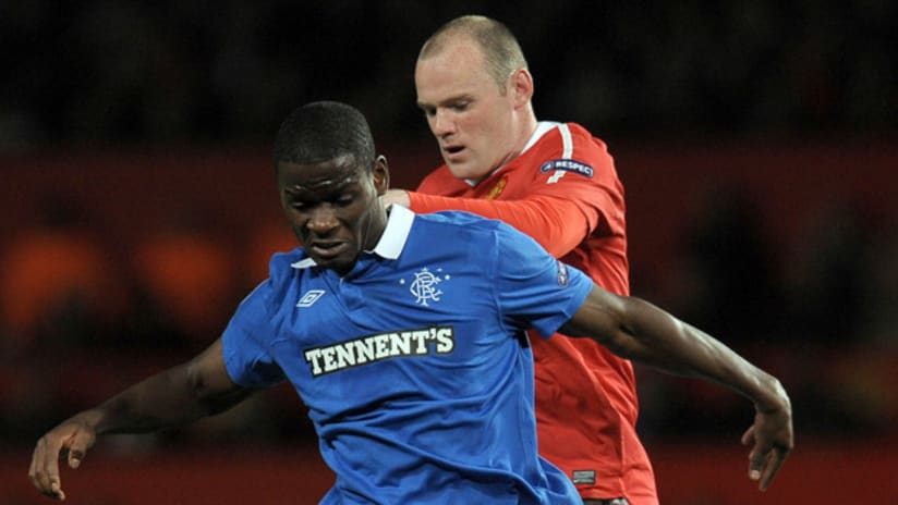 Maurice Edu and Rangers held Wayne Rooney and Manchester United to only three shots on goal.