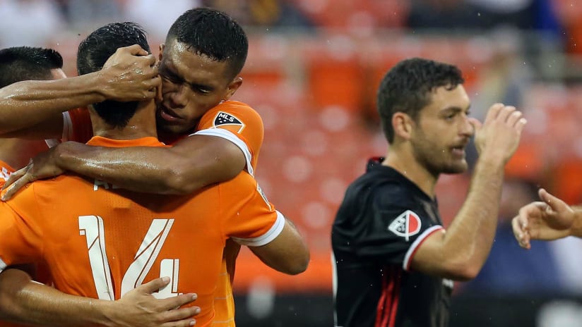 Houston Dynamo's Mauro Manotas hugs teammate Alex after scoring vs. D.C. United - 7-22-17