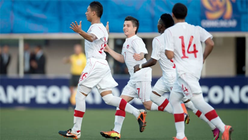 Marco Dominguez and Canada's U-17s celebrate