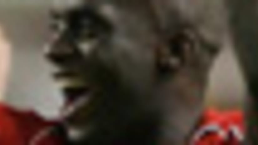 Liverpool midfielder Mohamed Sissoko (top) will remain with the club despite Serie A speculation.