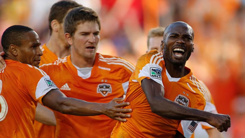 Omar Cummings celebrates his goal in HOUvNY playoffs