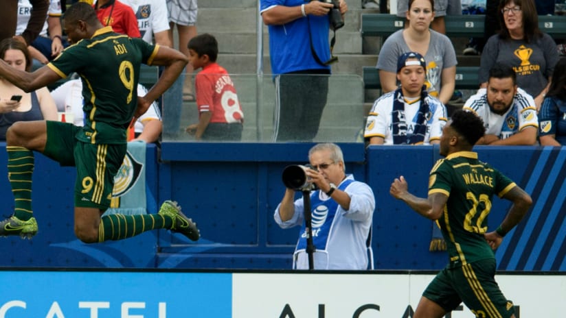 Fanendo Adi flies high to celebrate penalty kick goal against LA Galaxy