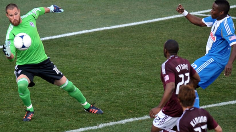 Colorado 'keeper Matt Pickens stops a shot from Philadelphia's Danny Mwanga