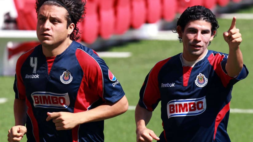 Guadalajara players Hector Reynoso (left) and Johnny Magallon (right).