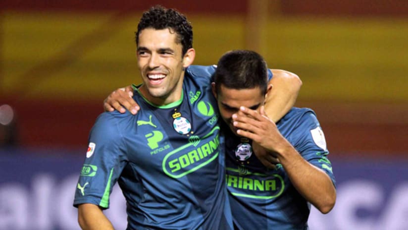 Herculez Gomez celebrates CCL goal with teammate