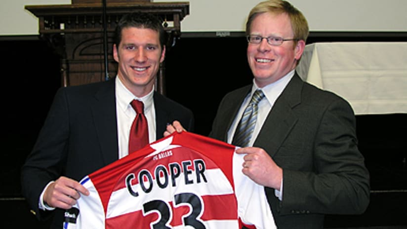 Kenny Cooper (left) scored his first goal in Hoops.