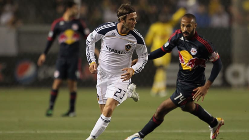 LA's David Beckham escapes from New York's Thierry Henry, May 7, 2011.