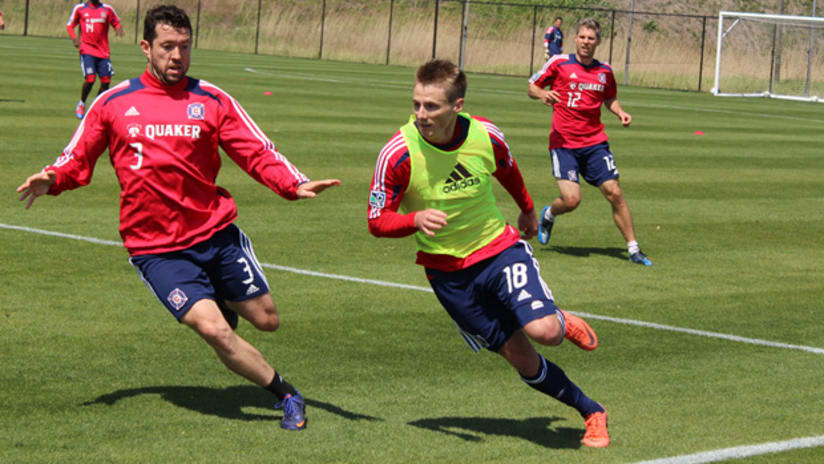 Chris Rolfe (center) works out with the Chicago Fire for the first time since returning to the team.