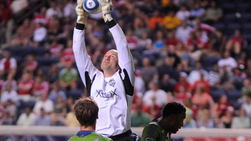 Seattle goalkeeper Kasey Keller snags a high ball against Chicago, June 4, 2011.