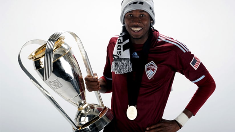 Macoumba Kandji holds the MLS Cup trophy after Colorado beat Dallas 2-1.