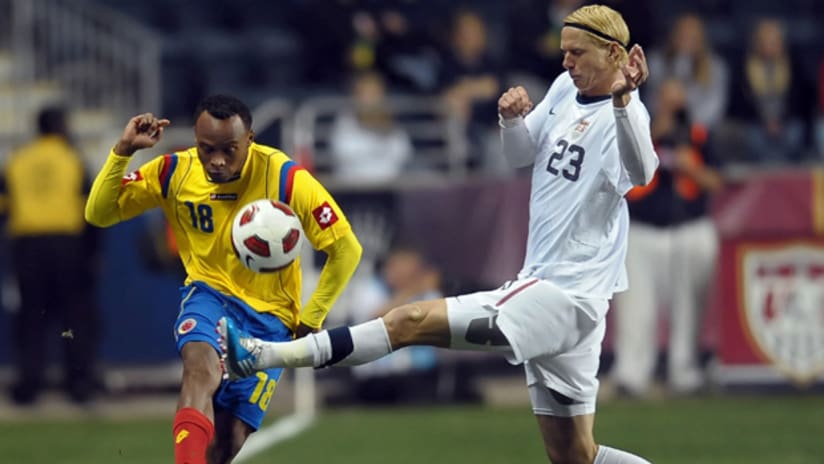 Brek Shea chases Colombian right back Camilo Zuniga, who contained the FC Dallas winger on Tuesday
