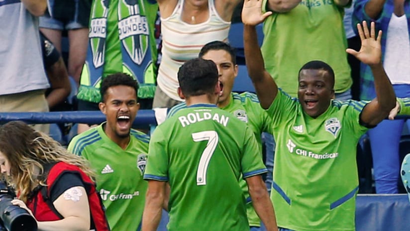 Cristian Roldan - Seattle Sounders - Celebrates with teammates