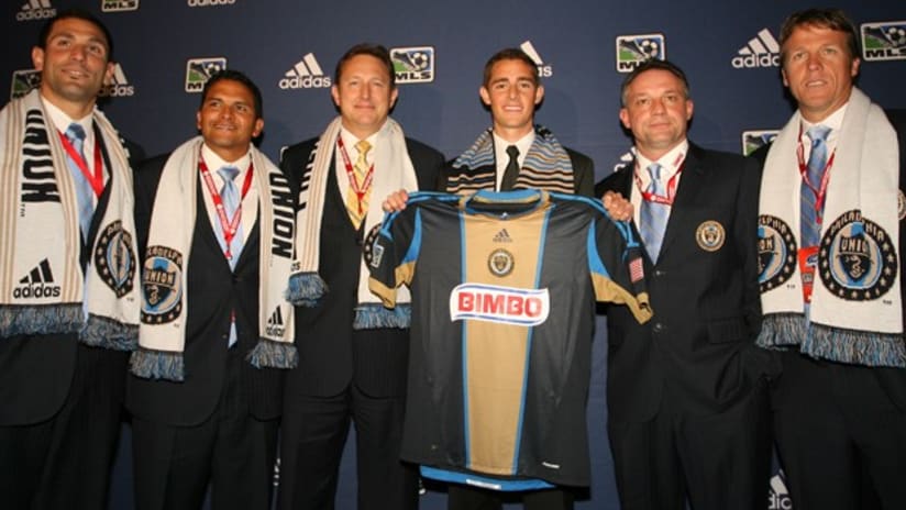 Chandler Hoffman is surrounded by the Philadelphia Union technical staff