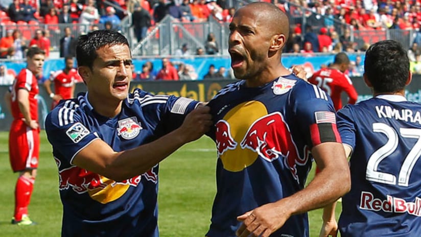 Tim Cahill and Thierry Henry