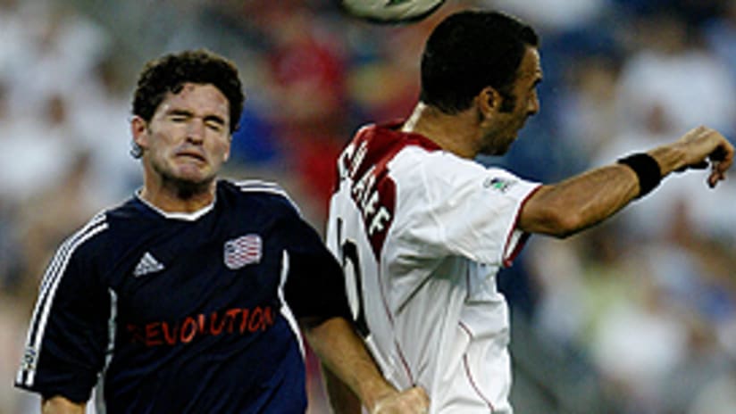Jay Heaps (L) and Youri Djorkaeff (R) both got goals but the Revs won the game.