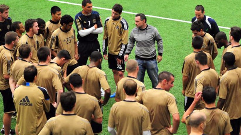 Union manager Peter Nowak talks to his players during preseason training.