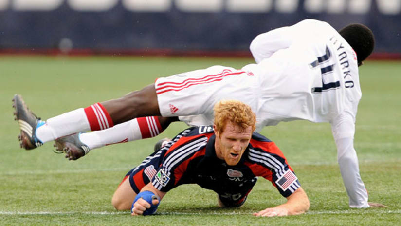 New England midfielder Pat Phelan (bottom) will share the load in Shalrie Joseph's absence.