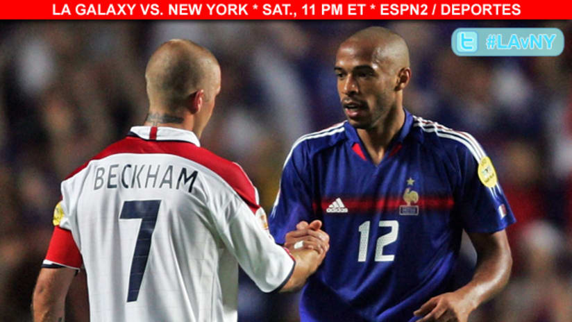 David Beckham and Thierry Henry shake hands during an international match.