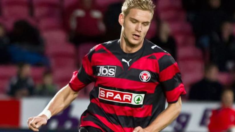 Seattle Sounders FC has signed Danish midfielder Christian Sivebaek