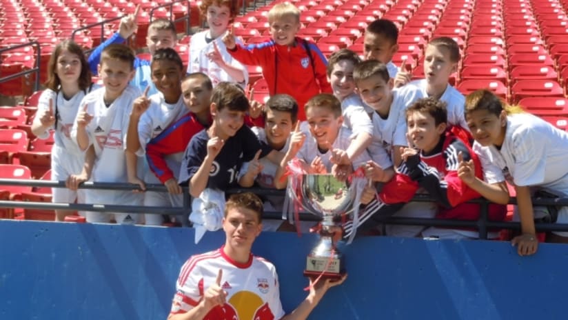 New York Red Bulls academy captain Mason Deeds celebrates Generation adidas Cup Premier Division title with Red Bulls youth players