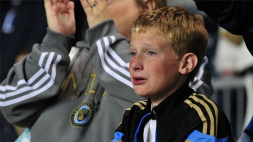 Philadelphia Union fan Tim Doyle cries after the club's US Open Cup final loss in 2014