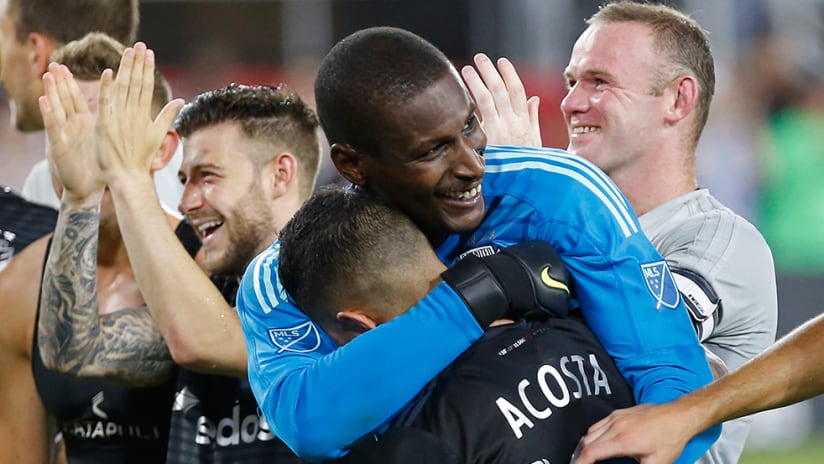 Bill Hamid - DC United - embraces Luciano Acosta after Portland win