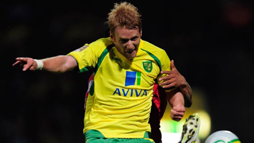 US defender Zak Whitbread and Norwich City have won promotion to the Premier League.